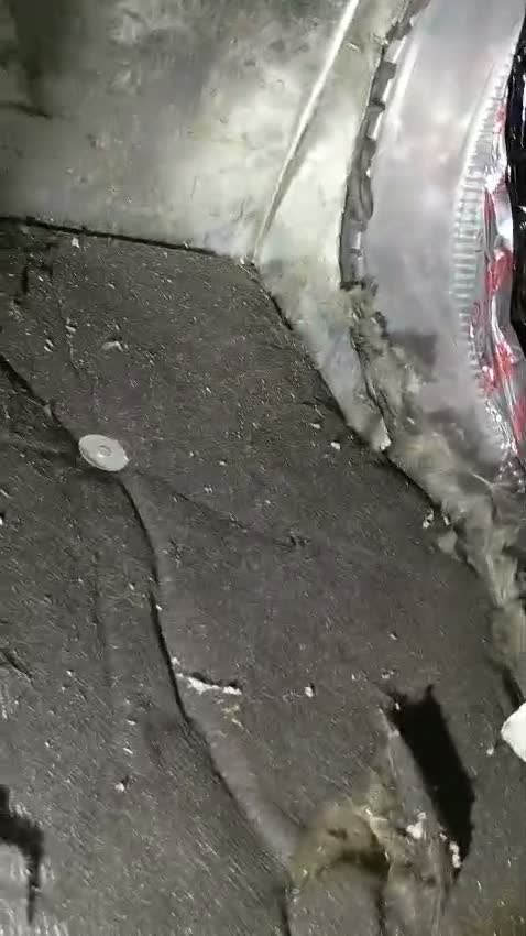 Dust buildup inside an air duct plenum before cleaning